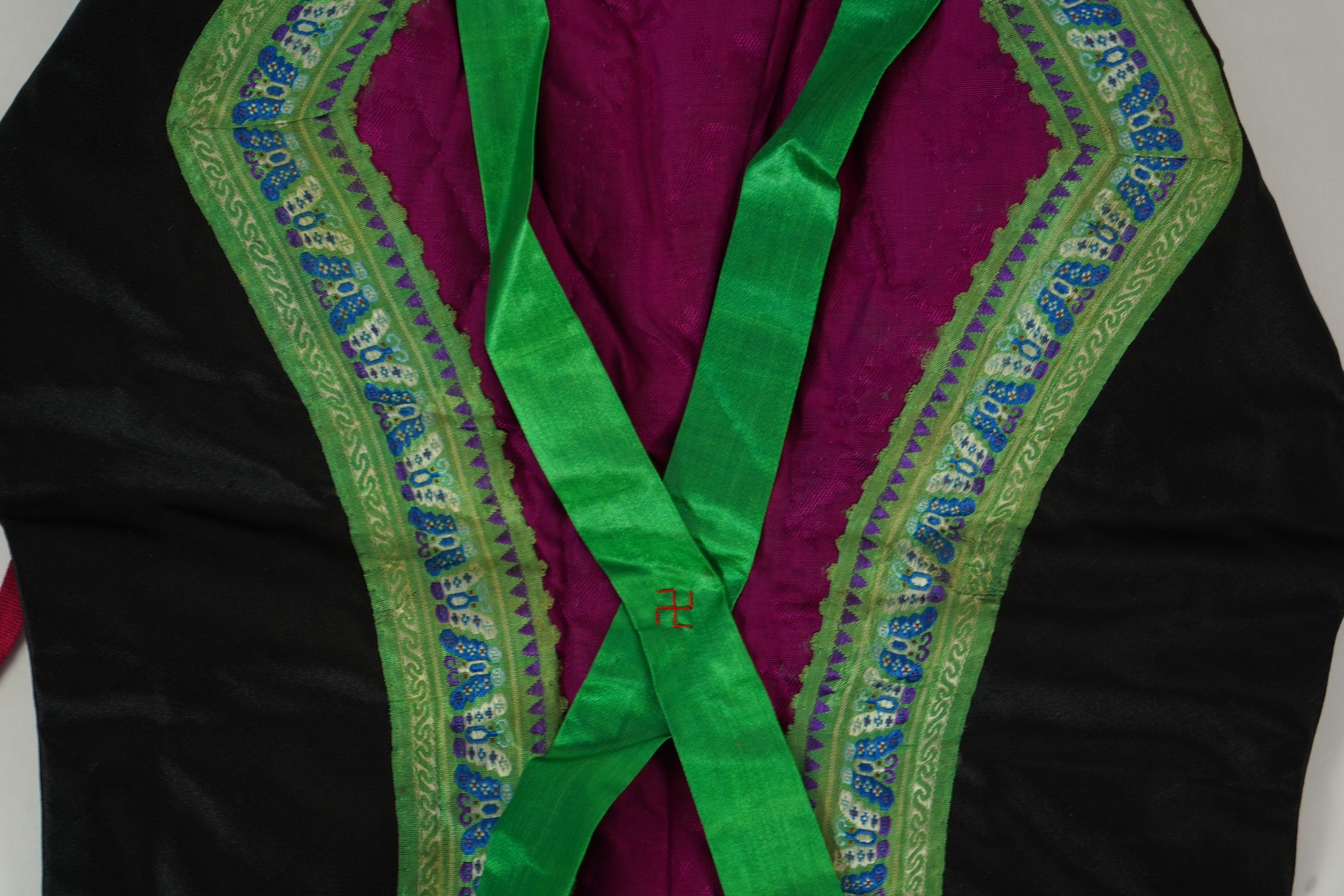 Two Chinese embroidered silk wedding skirts, late Qing, five hats, trousers, two skirt panels and two others, collar and a panel